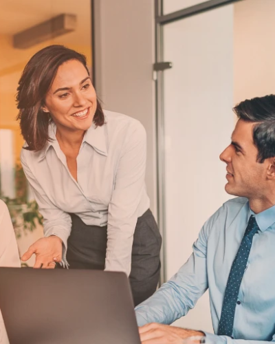 Group of business professionals discussing HR and payroll budgeting for 2026