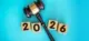 Gavel with “2026” symbolizing employer compliance guide 2026 for payroll, and benefits regulations