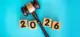 Gavel with “2026” symbolizing employer compliance guide 2026 for payroll, and benefits regulations