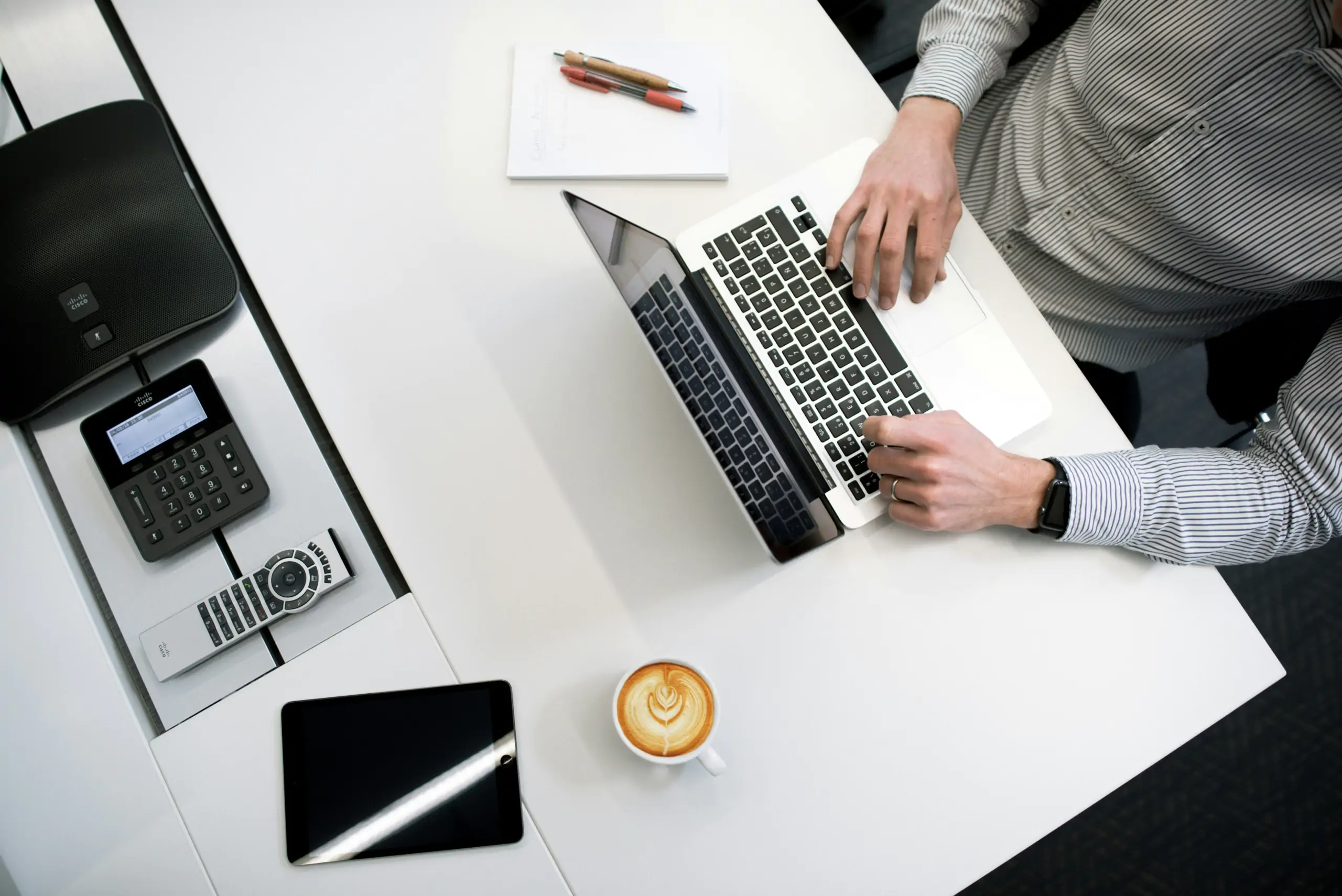Accountant reviewing client payroll reports with INFINITI HR partner dashboard